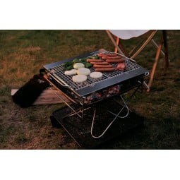 Snow Peak Pack & Carry Fireplace Kit als Grill eingesetzt