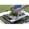 Jikaro Fire Ring Table mit Grill und Essen darauf