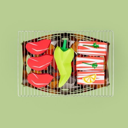 Picogrill 680 Feuerschale Ansicht von oben mit dekorativem Beispielessen darauf