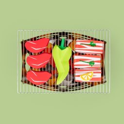 Picogrill 680 Feuerschale Ansicht von oben mit dekorativem Beispielessen darauf